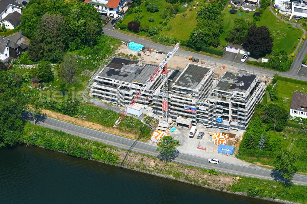 Aerial image Körbecke - Construction site for the multi-family residential building on the shore of the Moehnesee on street Seeblick - Seestrasse in Koerbecke in the state North Rhine-Westphalia, Germany