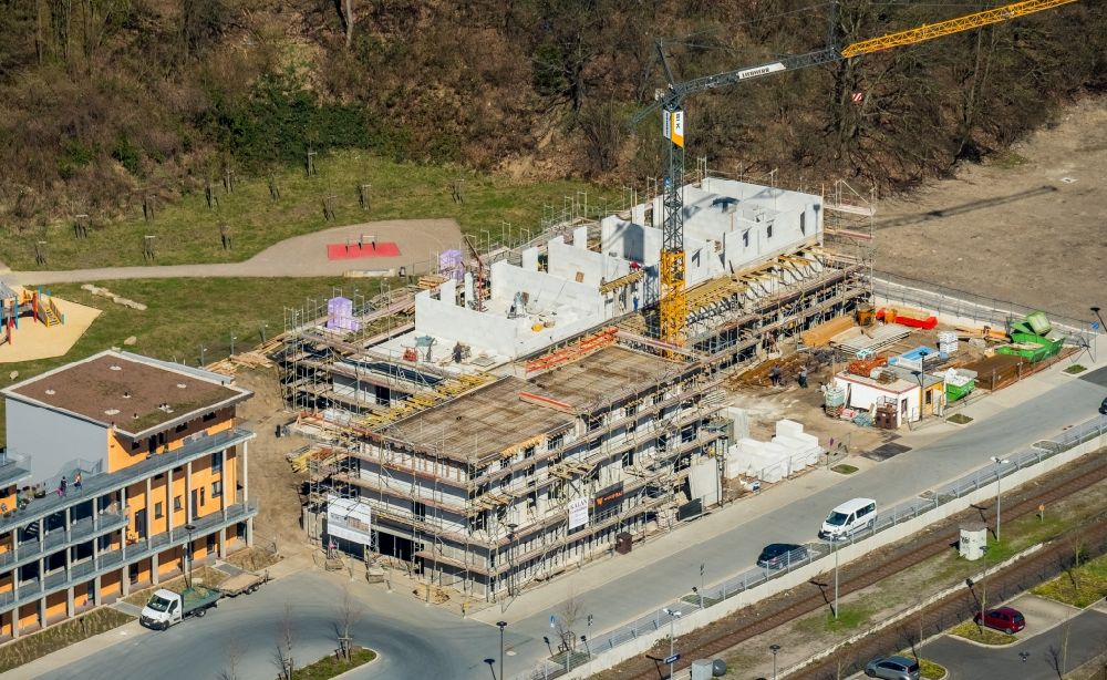 Herdecke from the bird's eye view: Construction site for the multi-family residential building of Wohnquartier Alter Steinbruch on Walter-Freitag-Strasse in the district Westende in Herdecke in the state North Rhine-Westphalia, Germany