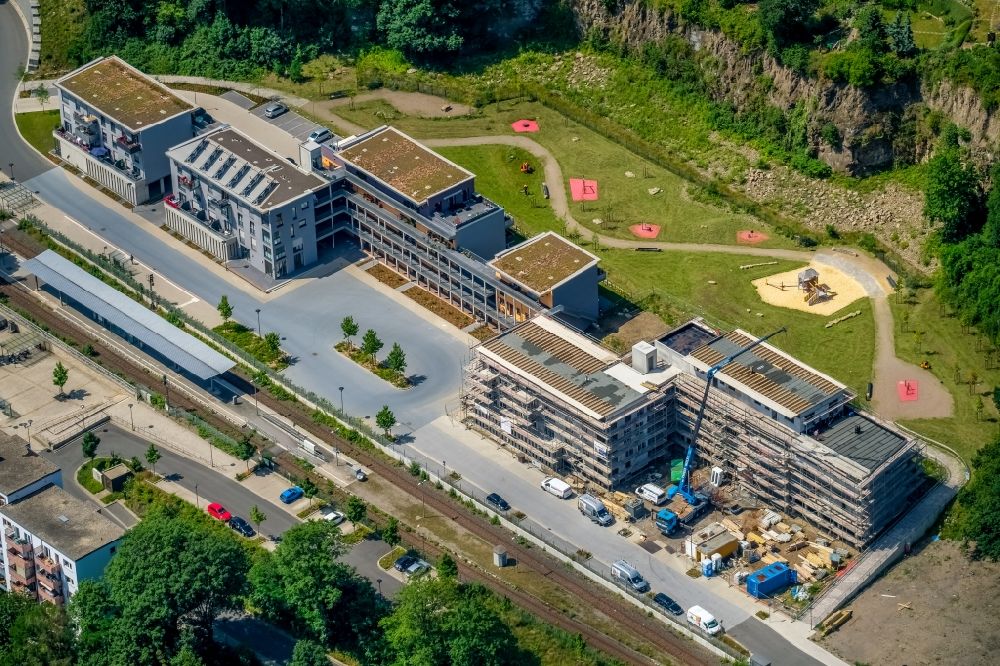 Aerial photograph Herdecke - Construction site for the multi-family residential building of Wohnquartier Alter Steinbruch on Walter-Freitag-Strasse in the district Westende in Herdecke in the state North Rhine-Westphalia, Germany