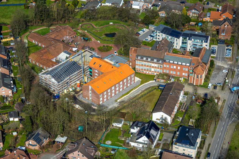 Aerial photograph Schermbeck - Construction site for the new construction of a dorm residential care home - building for the physically handicapped Caritas-Alten- and Pflege- einrichtung Marienheim on street Erler Strasse in Schermbeck in the state North Rhine-Westphalia, Germany