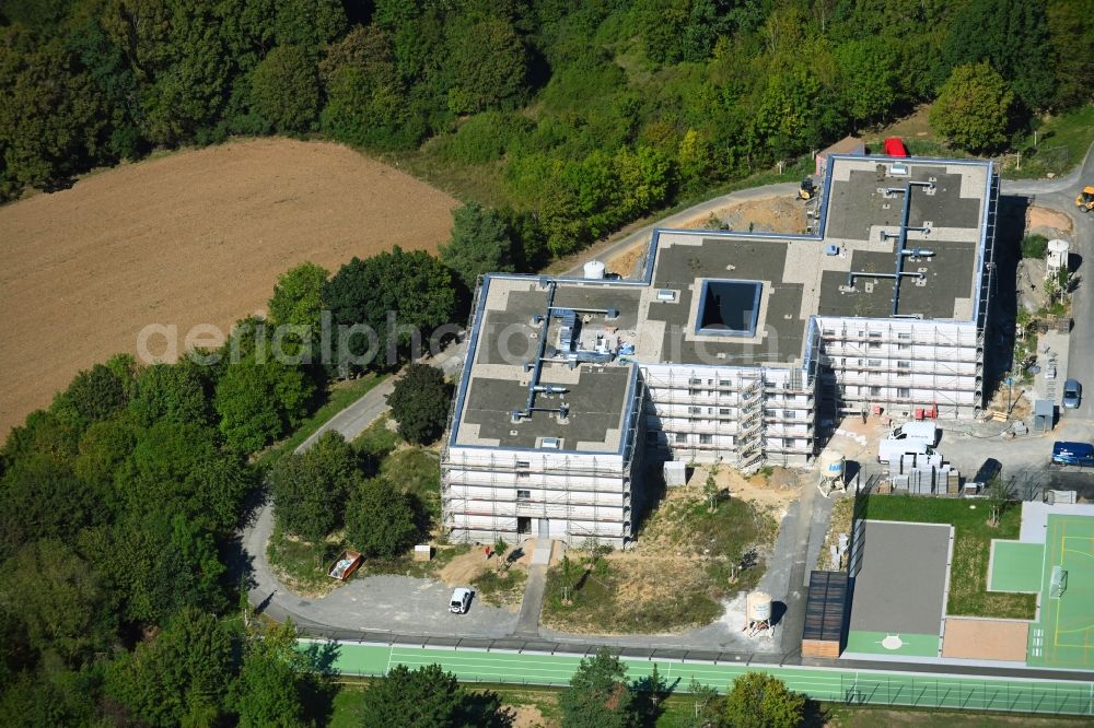 Würzburg from above - Construction site for the new construction of a dorm residential care home - building for the physically handicapped Jakob Riedinger Haus in the district Heuchelhof in Wuerzburg in the state Bavaria, Germany