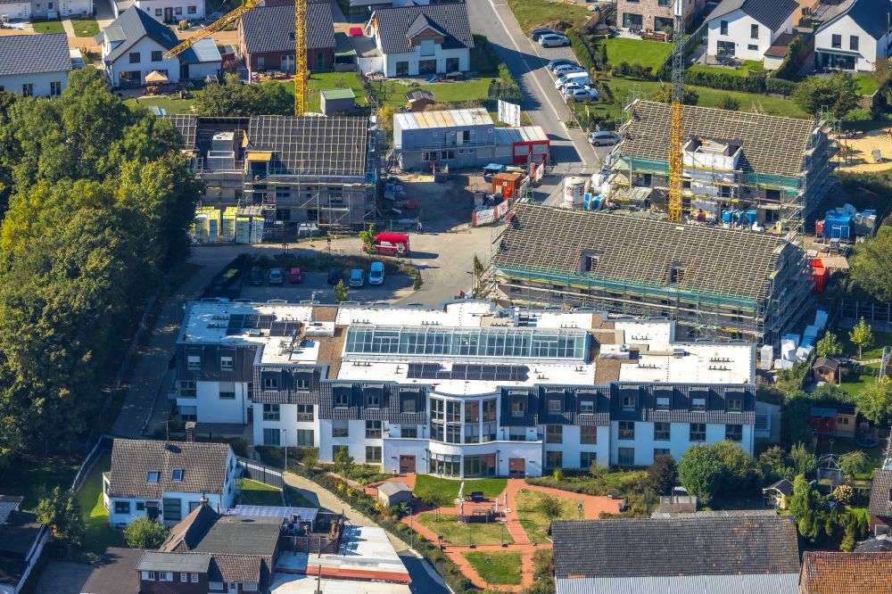 Aerial photograph Unna - Construction site for the new construction of a dorm residential care home - building for the physically handicapped Pflegewohnanlage Haus on Hellweg on street Grosse-Oetringhaus-Strasse in the district Hemmerde in Unna at Ruhrgebiet in the state North Rhine-Westphalia, Germany