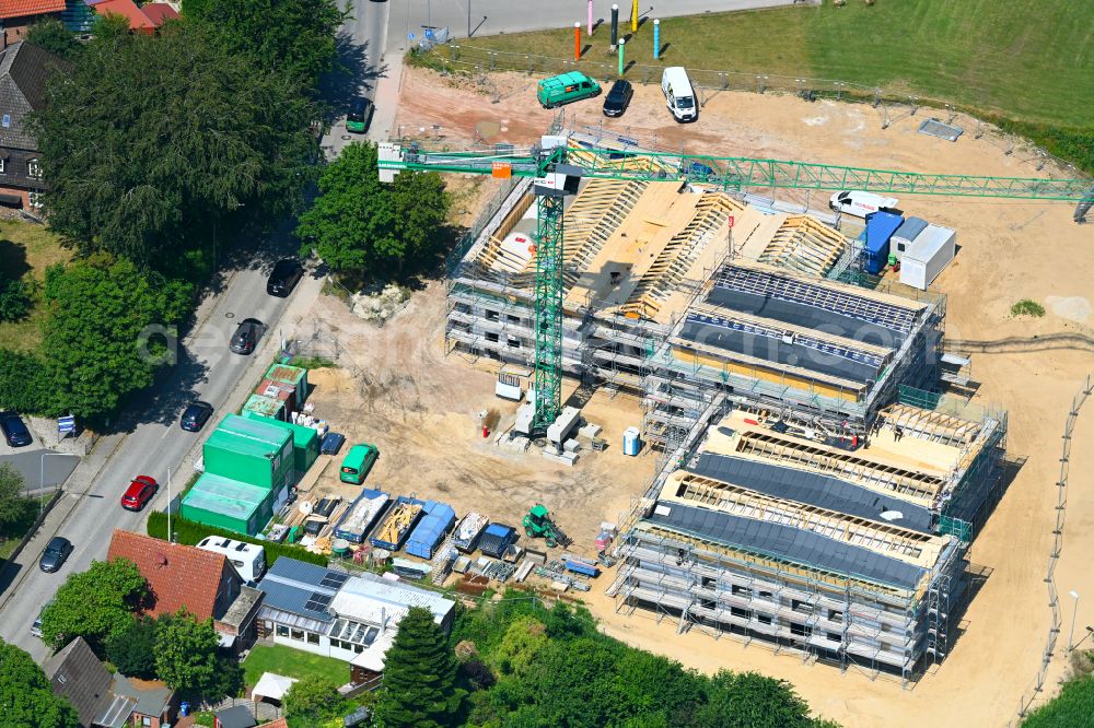 Meldorf from above - Construction site for the new construction of a nursing home - building for disabled people of the Foundation Man on Kampstrasse in Meldorf in the state Schleswig-Holstein, Germany