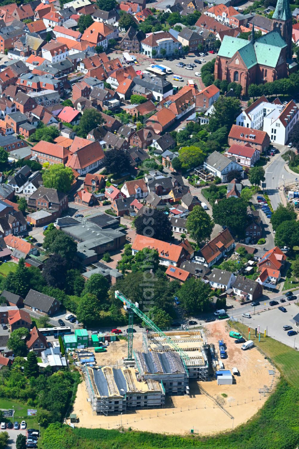 Meldorf from the bird's eye view: Construction site for the new construction of a nursing home - building for disabled people of the Foundation Man on Kampstrasse in Meldorf in the state Schleswig-Holstein, Germany