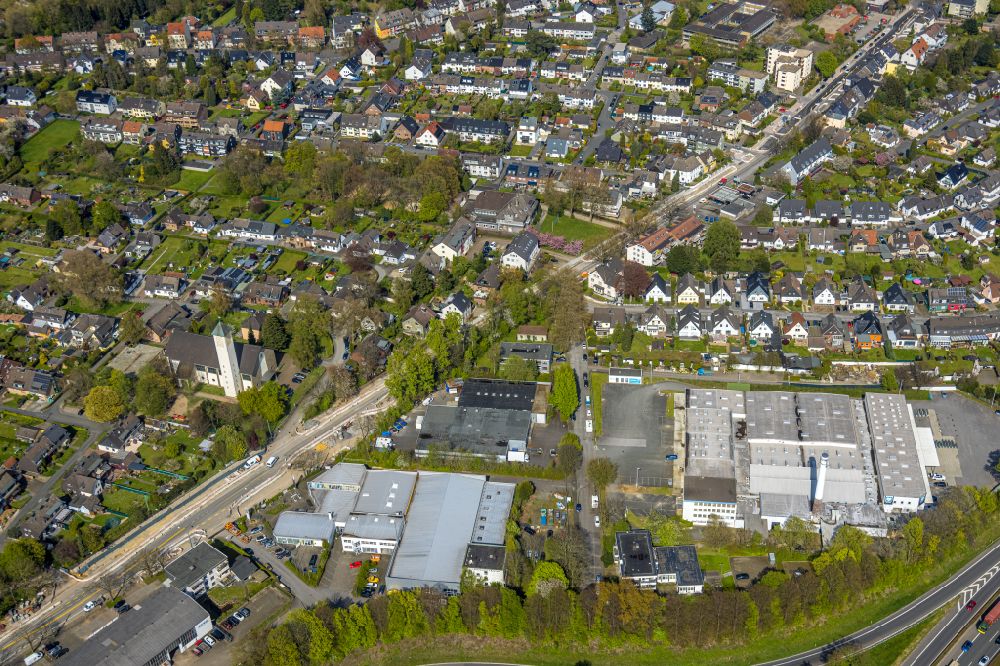 Bochum from the bird's eye view: Construction site for the new building and extension of the road on Harpener Hellweg in the district Harpen in Bochum at Ruhrgebiet in the state North Rhine-Westphalia, Germany
