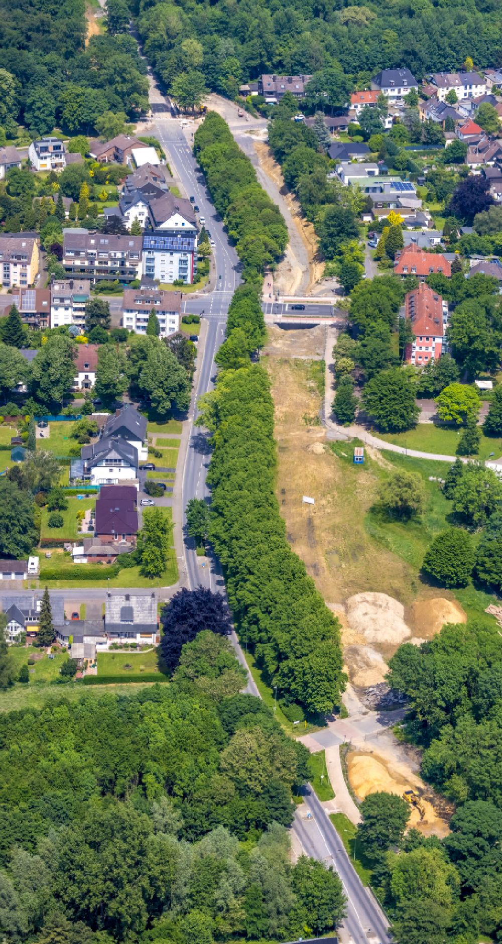 Aerial photograph Herne - Construction site for the new building and extension of the road to the Unterfuehrung of Mont-Cenis-Strasse - Hoelkeskampring in Herne at Ruhrgebiet in the state North Rhine-Westphalia, Germany