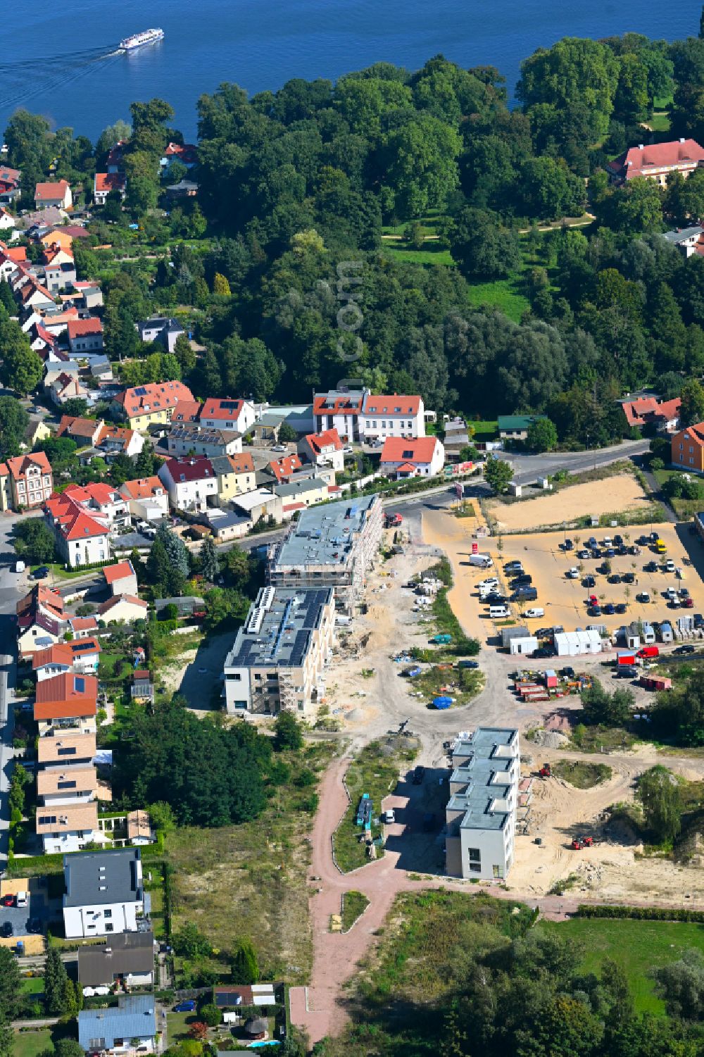Aerial image Caputh - Construction site for the new construction of two multi-family residential buildings in the Blumenviertel on street Kirschanger in Caputh in the state Brandenburg, Germany