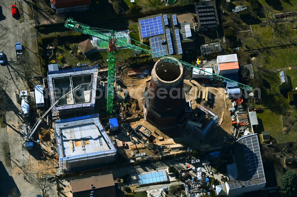 Berlin from above - Construction site for the construction of two new residential buildings and conversion of the water tower into a residential building on Schirnerstrasse in the district of Altglienicke in Berlin, Germany