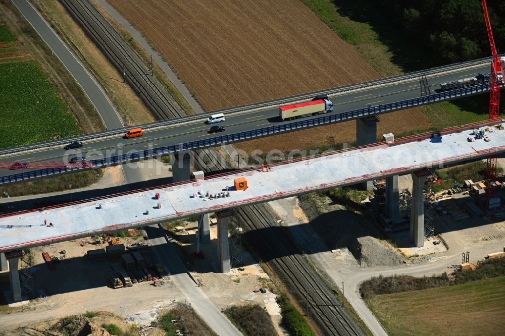 Aerial photograph Rottendorf - Construction site for the rehabilitation and repair of the motorway bridge construction of the viaduct Rothof along the BAB A7 in Rottendorf in the state Bavaria, Germany