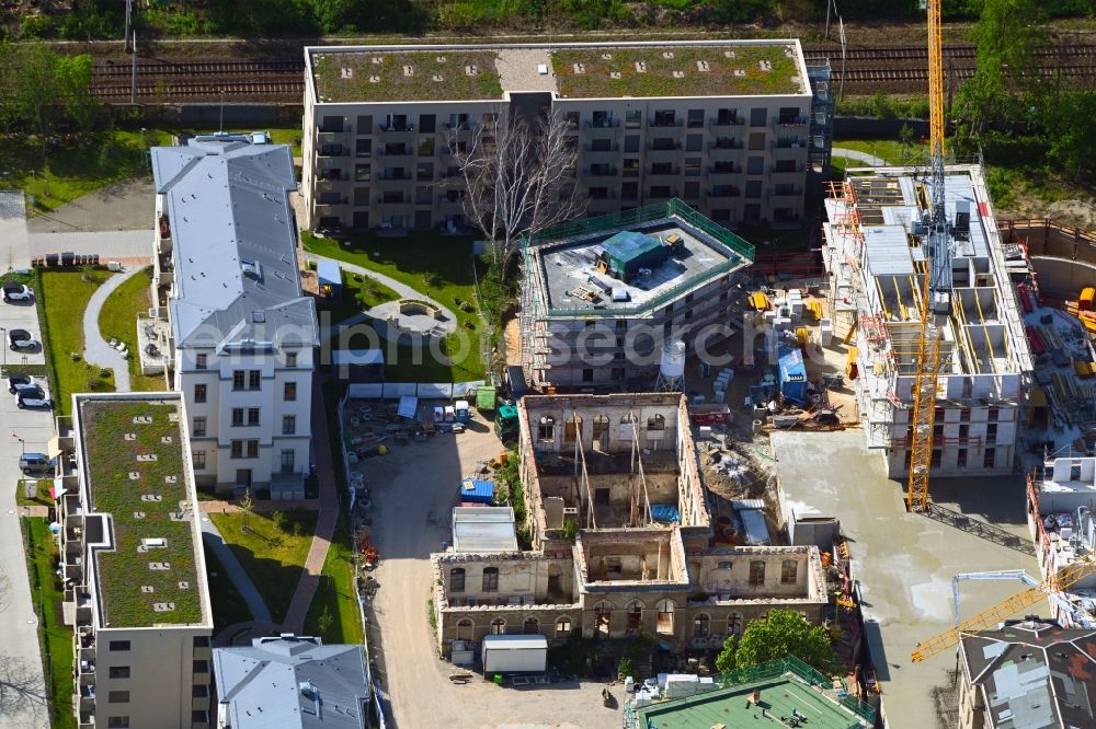 Dresden from the bird's eye view: Construction for the reconstruction and expansion of the old buildings listed building Ehemalige Arbeitsanstalt in of Koenigsbruecker Strasse in the district Albertstadt in Dresden in the state Saxony, Germany