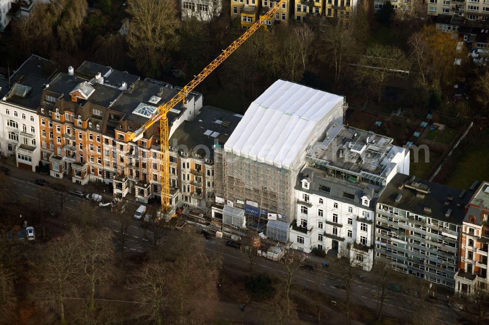 Hamburg from the bird's eye view: Construction for the reconstruction and expansion of the old buildings listed building on Schwanenwik in the district Uhlenhorst in Hamburg, Germany