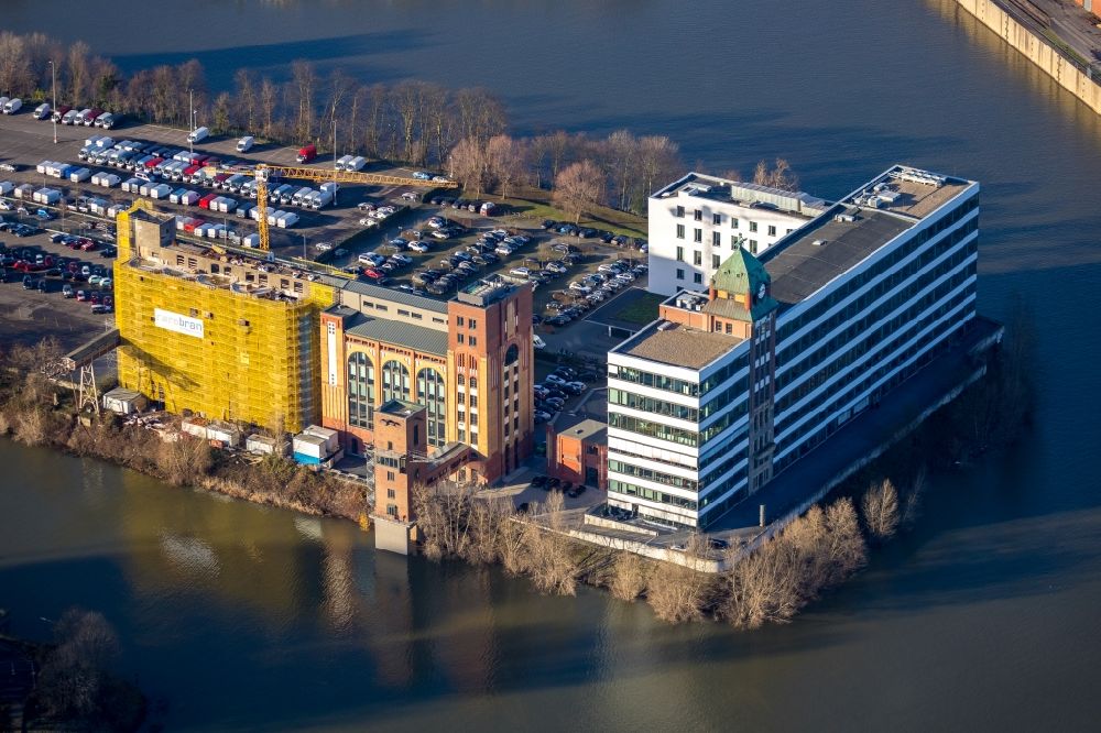 Düsseldorf from the bird's eye view: Construction site for the conversion of the former Plange mill to an office and commercial building in Dusseldorf in the federal state of North Rhine-Westphalia, Germany