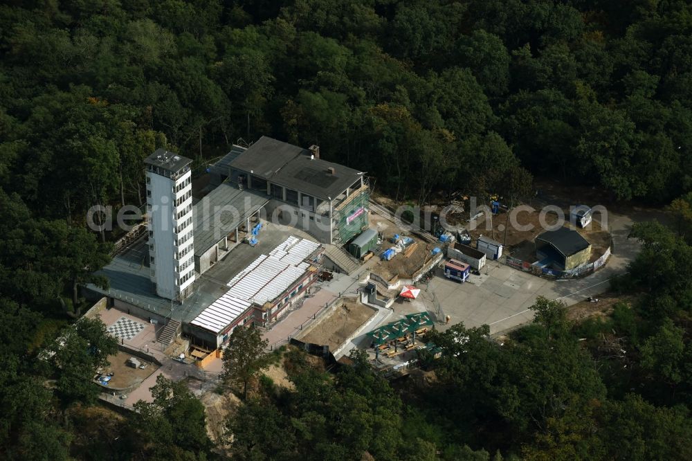 Aerial photograph Berlin - Site for the reconstruction of the tower- building ensemble of Mueggelturm in the forest Mueggelbergen Koepenick in Berlin