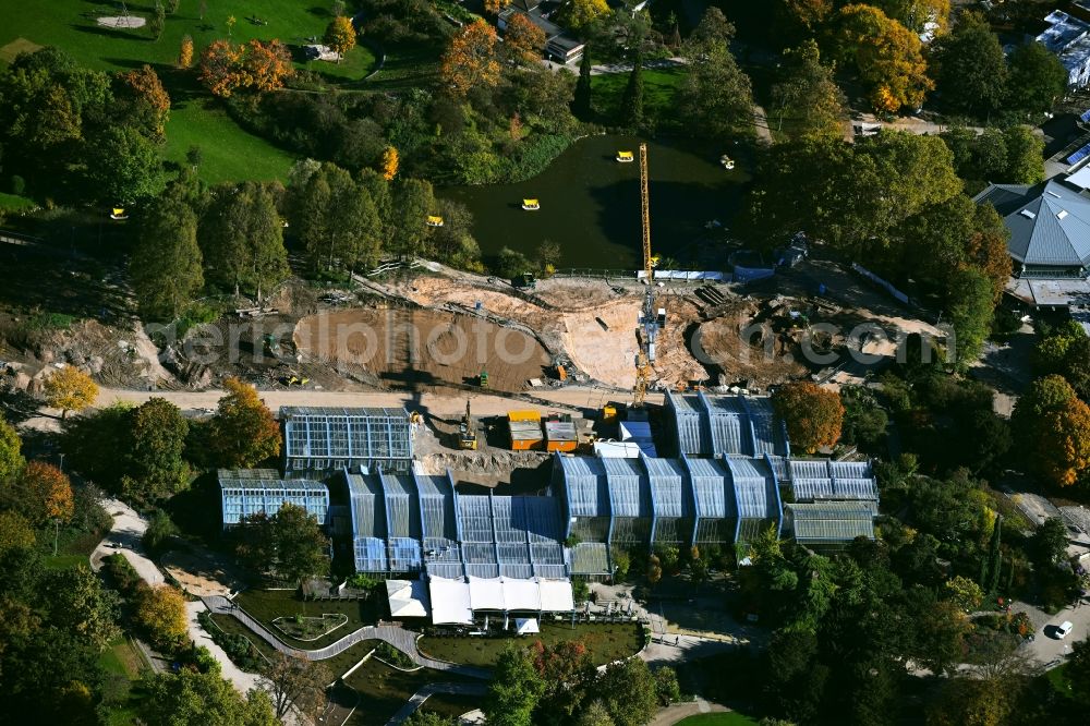 Mannheim from the bird's eye view: Construction site for the design of a supplementary new building of the existing park with paths and green areas Luisenpark in the district Oststadt in Mannheim in the state Baden-Wuerttemberg, Germany