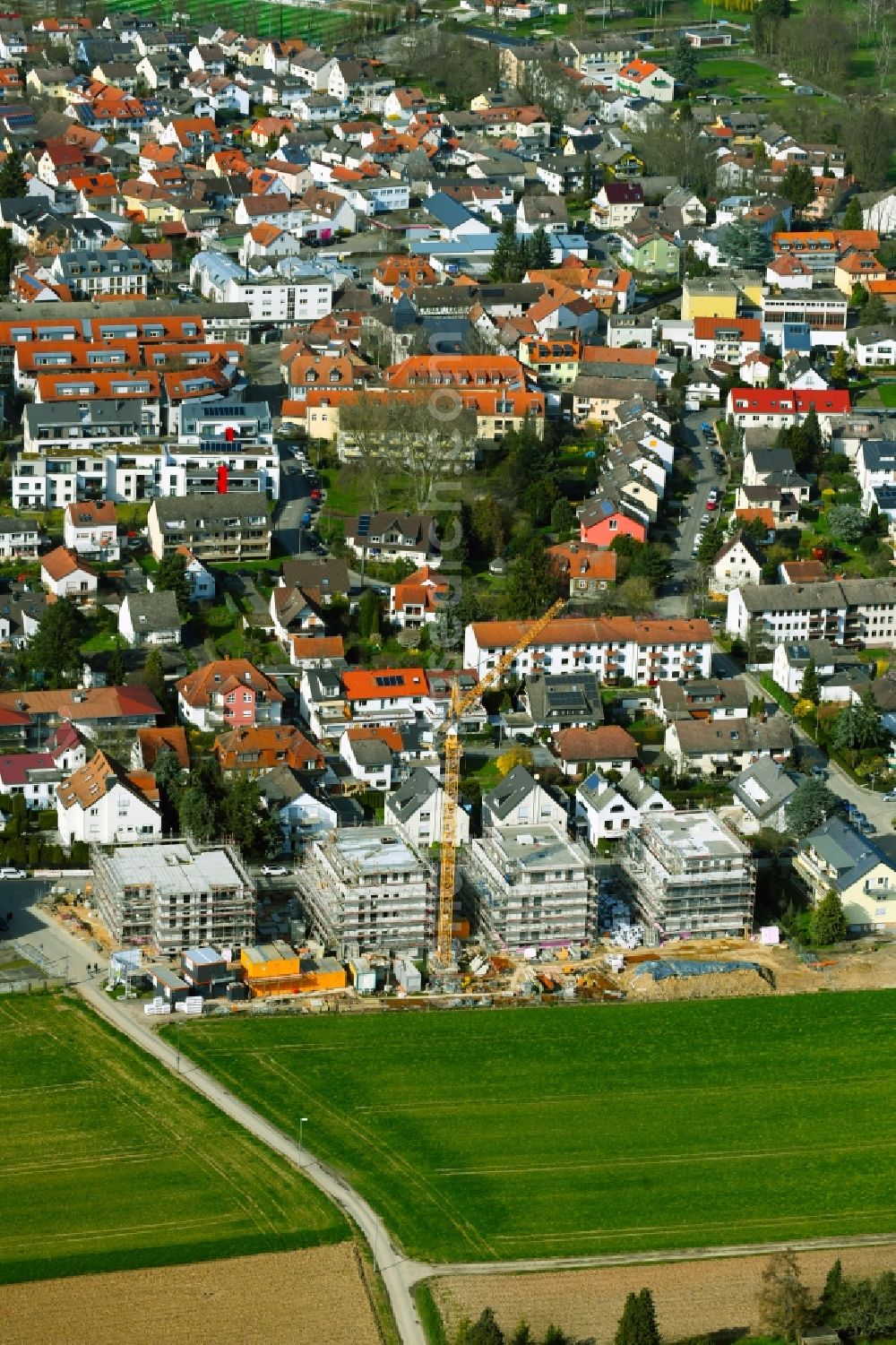Aerial photograph Nieder-Eschbach - Residential areas - Construction site with multi-family housing development - New building on the outskirts of the town in Nieder-Eschbach in the state of Hesse, Germany