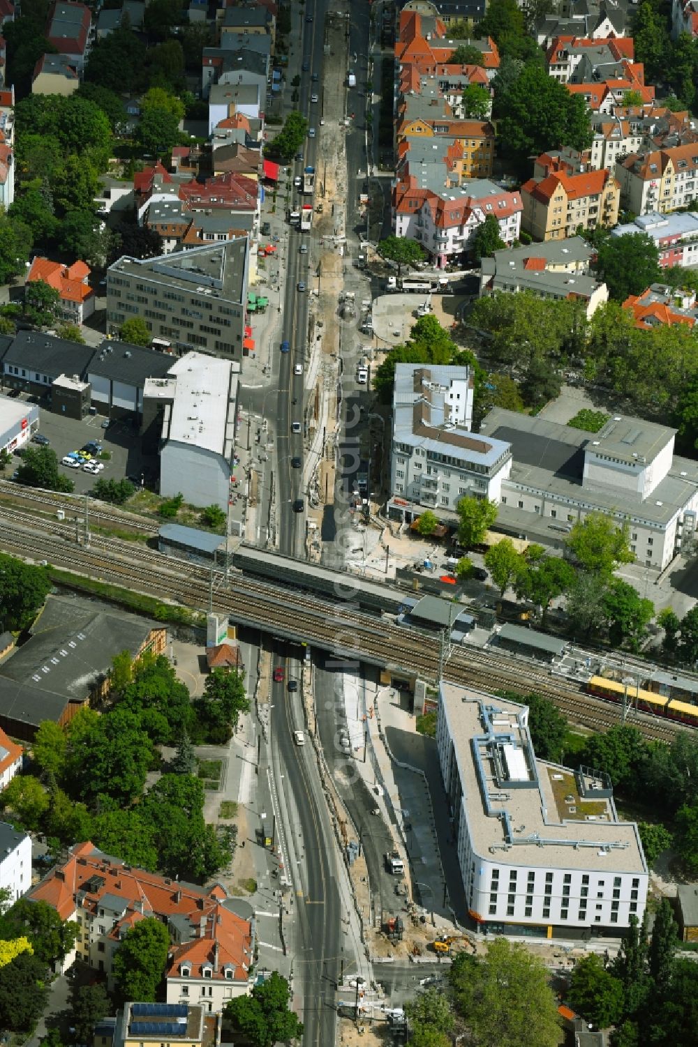 Berlin from the bird's eye view: Construction site for the renewal and rehabilitation of the road of Treskowallee in the district Karlshorst in Berlin, Germany