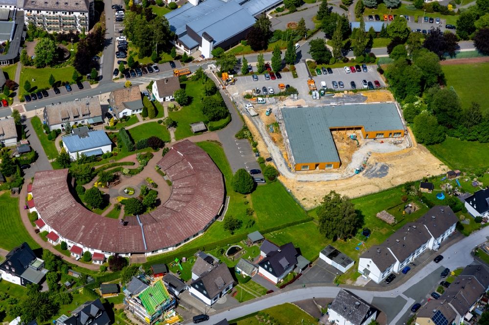 Olsberg from the bird's eye view: New construction site for the construction of a kindergarten building and Nursery school on Pappelallee in Olsberg in the state North Rhine-Westphalia, Germany