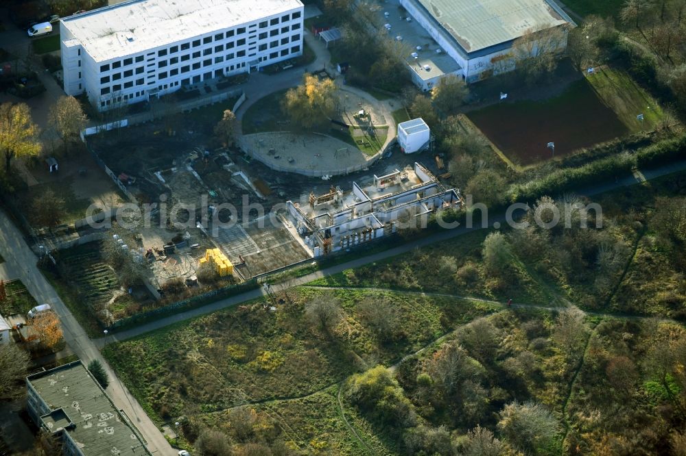 Berlin from the bird's eye view: New construction site for the construction of a kindergarten building and Nursery school on Peter-Huchel-Strasse in the district Kaulsdorf in Berlin, Germany