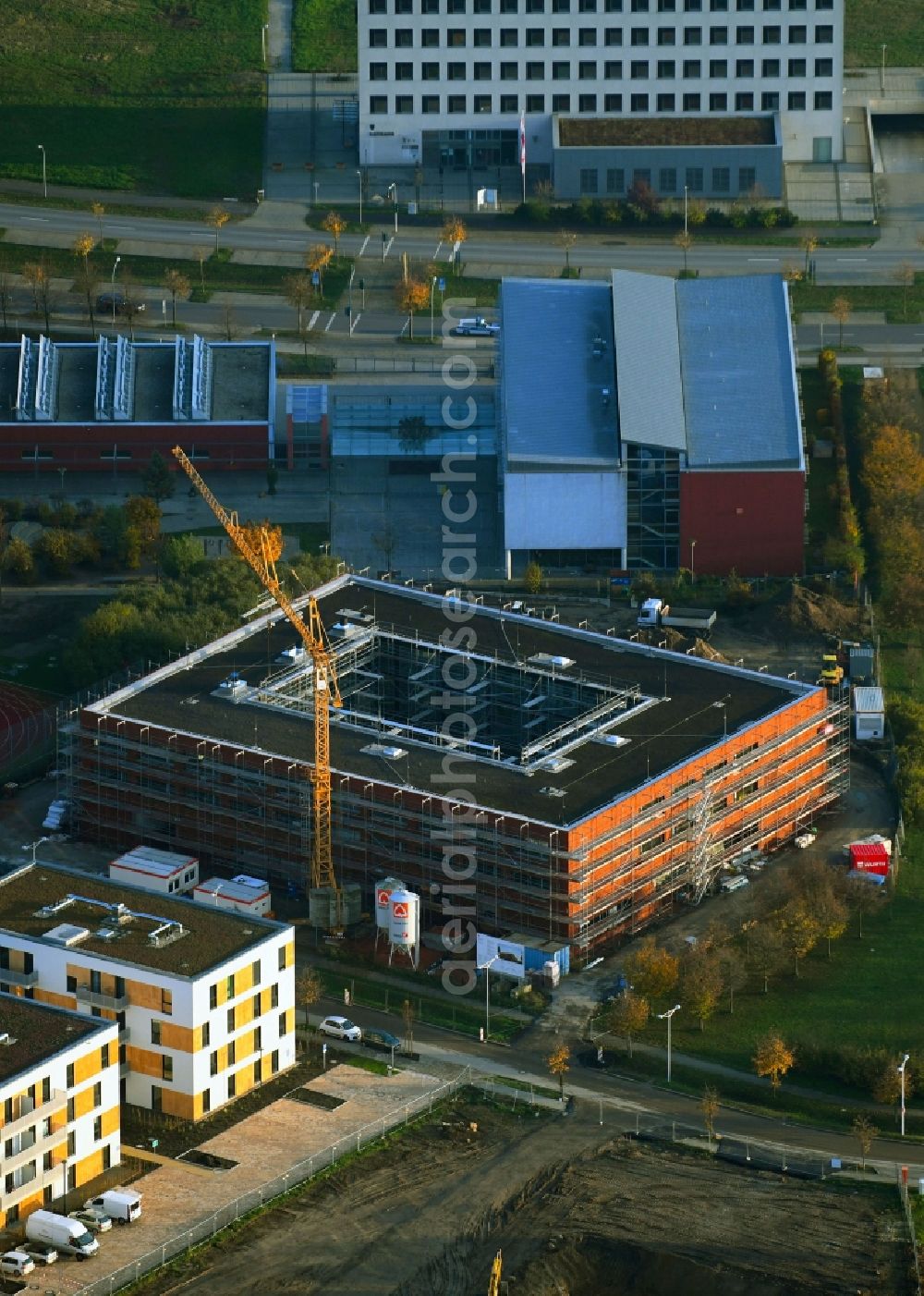 Aerial photograph Schönefeld - New construction site for the construction of a kindergarten building and Nursery school with integrierter Mensa in Schoenefeld in the state Brandenburg, Germany