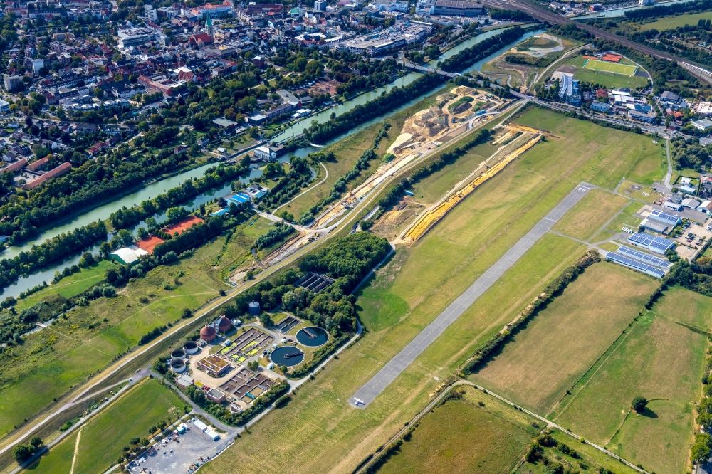 Aerial image Hamm - Building site for the construction and design of a new park with paths and green spaces named Erlebensraum Lippeaue with the Hamm airport and the newly built canal construction in Hamm in the federal state of North Rhine-Westphalia, Germany