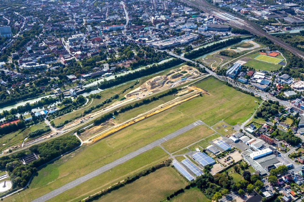 Aerial photograph Hamm - Building site for the construction and design of a new park with paths and green spaces named Erlebensraum Lippeaue with the Hamm airport and the newly built canal construction in Hamm in the federal state of North Rhine-Westphalia, Germany