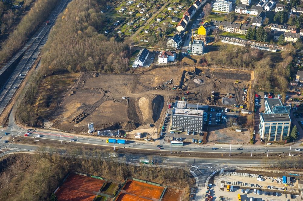 Bochum from the bird's eye view: Construction site for the mixed development of residential and commercial space of KAPPEL Grundstuecks- & Verwaltungsgesellschaft mbH at Universitaetsstrasse in Bochum in the federal state of North Rhine-Westphalia, Germany