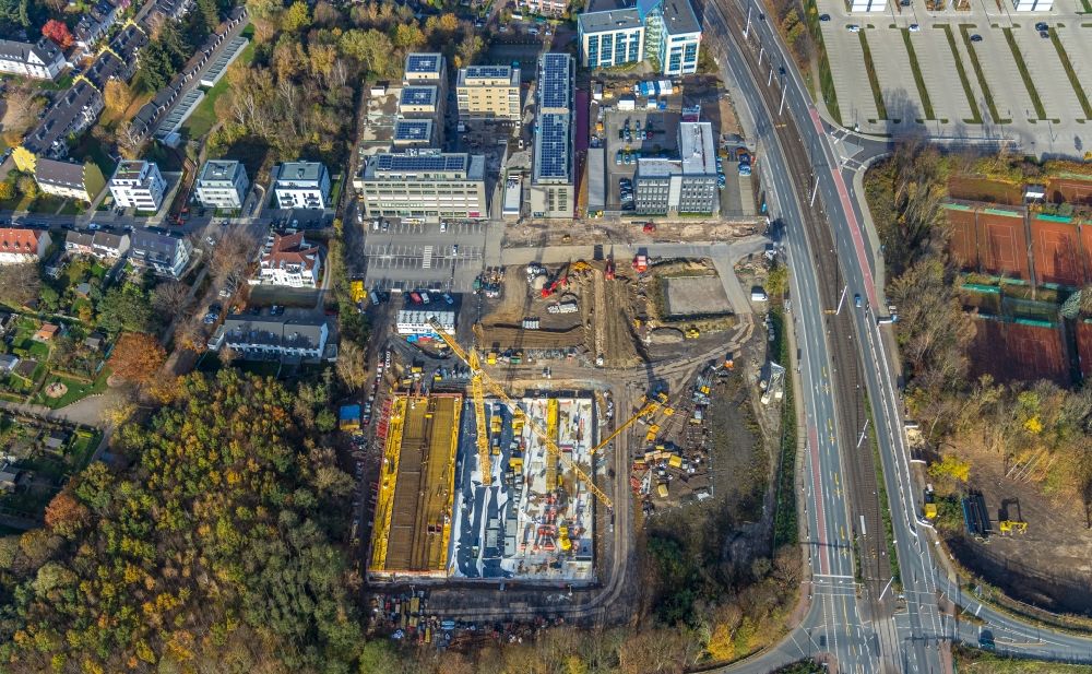 Bochum from the bird's eye view: Construction site for the mixed development of residential and commercial space on the Seven-Stones-Areal at Universitaetsstrasse in Bochum in the federal state of North Rhine-Westphalia, Germany