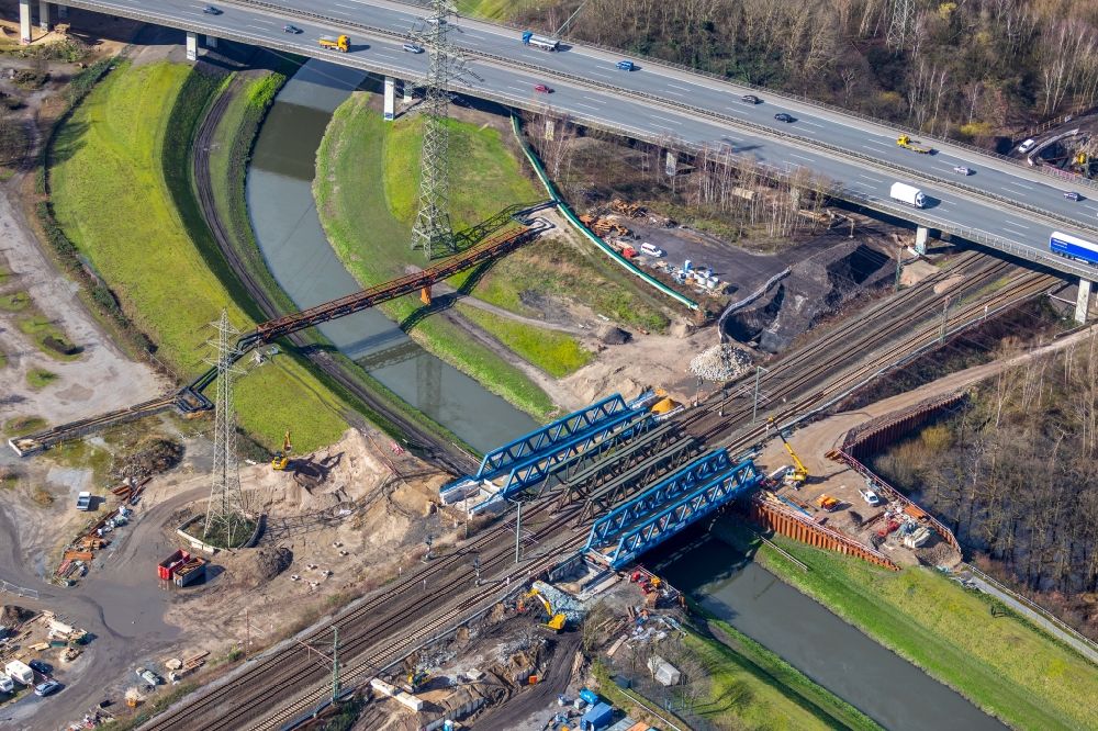 Aerial photograph Oberhausen - Construction for the renovation of the railway bridge building to route the train tracks about the river Emscher in Oberhausen in the state North Rhine-Westphalia, Germany