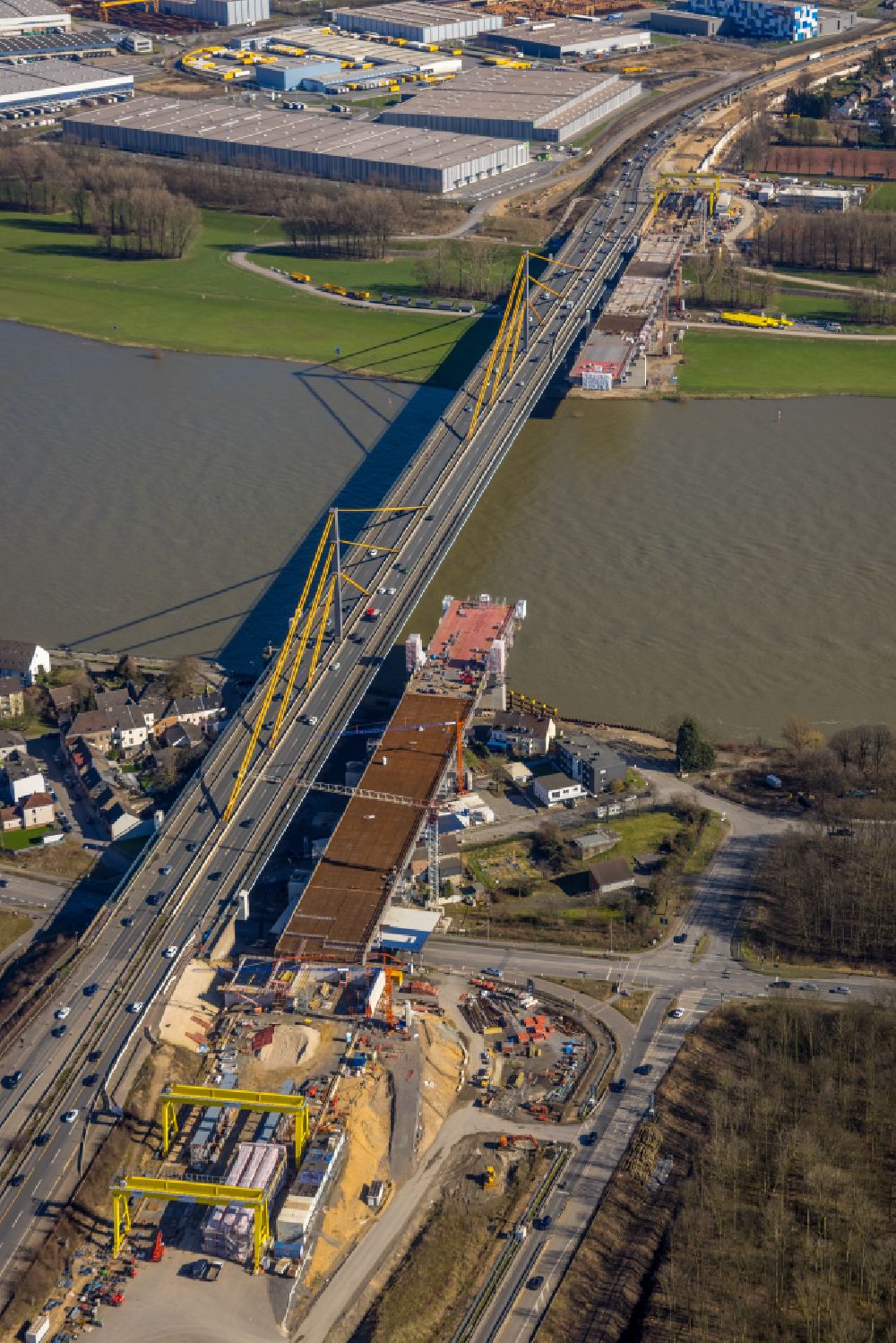 Duisburg from the bird's eye view: Construction site for the rehabilitation and repair of the motorway bridge construction Rheinbruecke Duisburg-Neuenkamp in the district Homberg in Duisburg at Ruhrgebiet in the state North Rhine-Westphalia, Germany