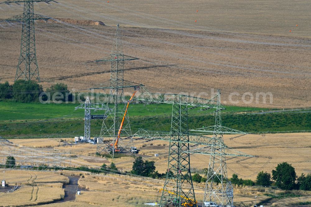 Schwanebeck from above - Construction on electric pole installation in Schwanebeck in the state Brandenburg, Germany