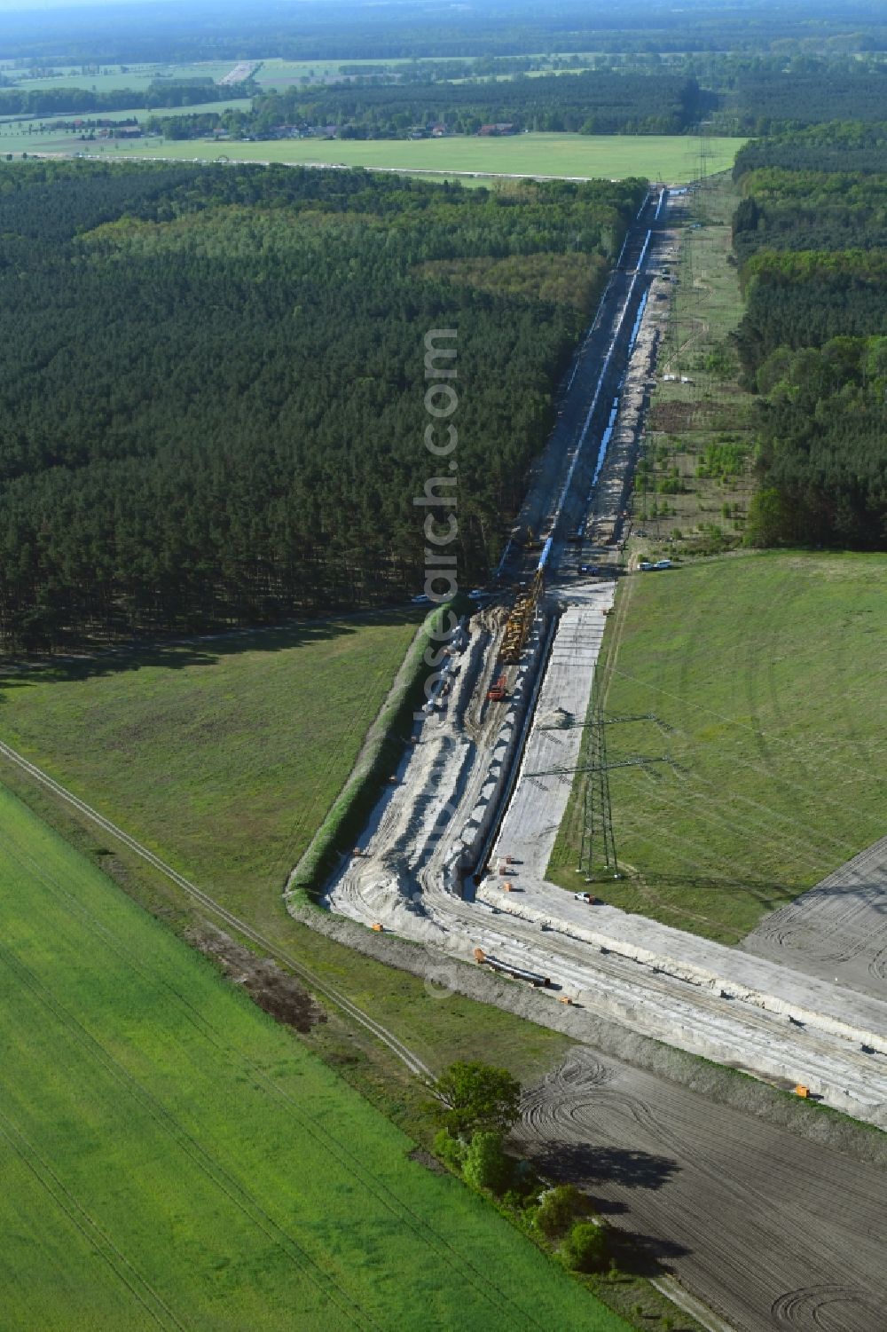 Aerial image Friedrichshof - Construction site with earthworks and landfills for the laying of pipelines of the new European Gas Lines (Eugal) on a field in Gross Koeris in the state Brandenburg, Germany