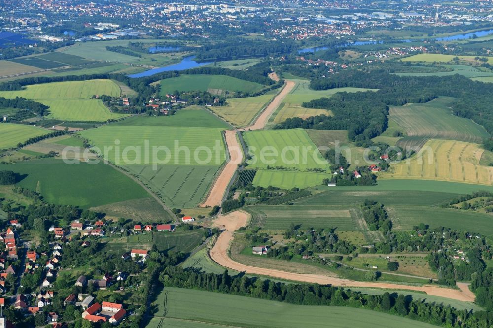 Naustadt from the bird's eye view: Construction site with earthworks and landfills for the laying of pipelines of the new European Gas Lines (Eugal) on a field near Gross Koeris in the state Brandenburg, Germany