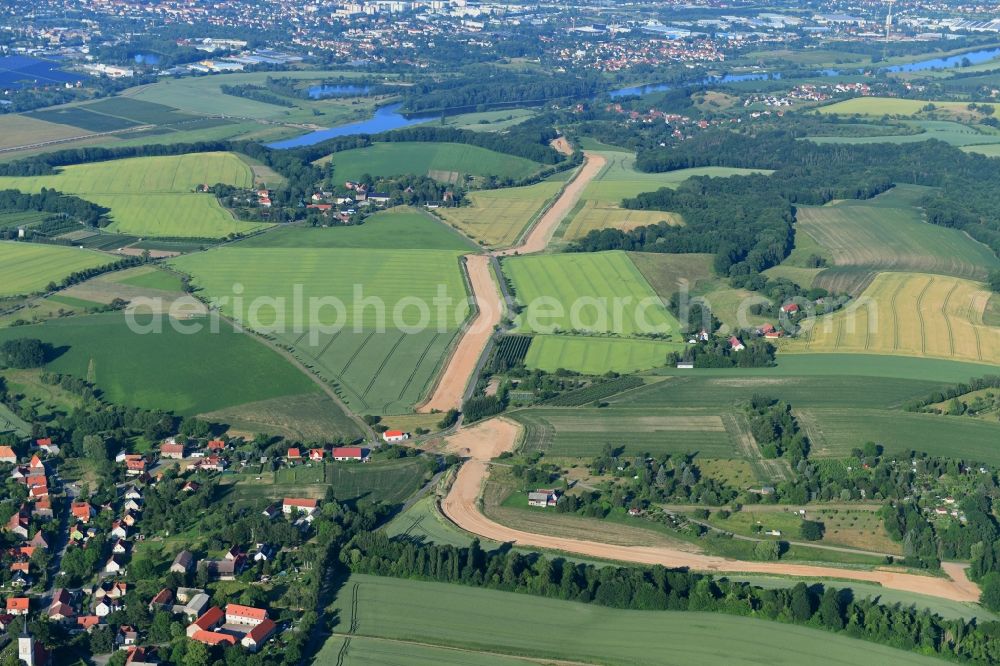 Aerial image Naustadt - Construction site with earthworks and landfills for the laying of pipelines of the new European Gas Lines (Eugal) on a field near Gross Koeris in the state Brandenburg, Germany