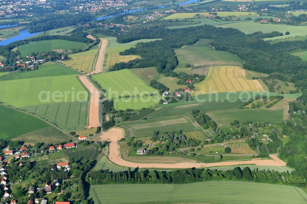 Aerial photograph Naustadt - Construction site with earthworks and landfills for the laying of pipelines of the new European Gas Lines (Eugal) on a field near Gross Koeris in the state Brandenburg, Germany