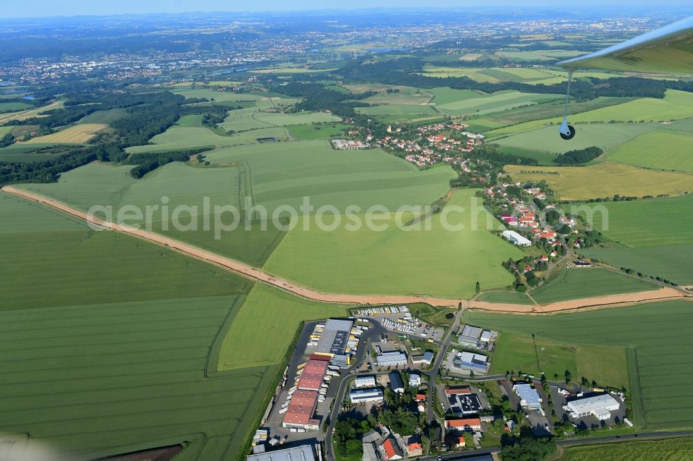 Röhrsdorf from the bird's eye view: Construction site with earthworks and landfills for the laying of pipelines of the new European Gas Lines (Eugal) on a field near Gross Koeris in the state Brandenburg, Germany