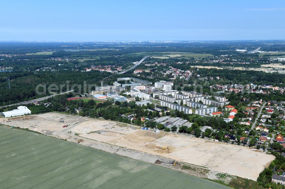 Aerial image Rüdersdorf - Construction site for the preparation of a new residential area on Woltersdorfer Strasse in Ruedersdorf in the state of Brandenburg. The area is being prepared to facilitate the construction of new residential buildings and apartment blocks
