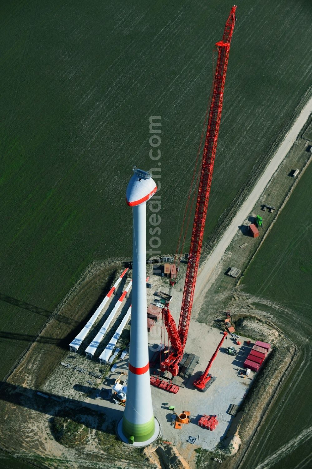 Aerial photograph Niedergörsdorf - Construction site for wind turbine installation on a field in Niedergoersdorf in the state Brandenburg, Germany