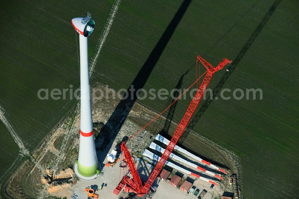 Niedergörsdorf from the bird's eye view: Construction site for wind turbine installation on a field in Niedergoersdorf in the state Brandenburg, Germany