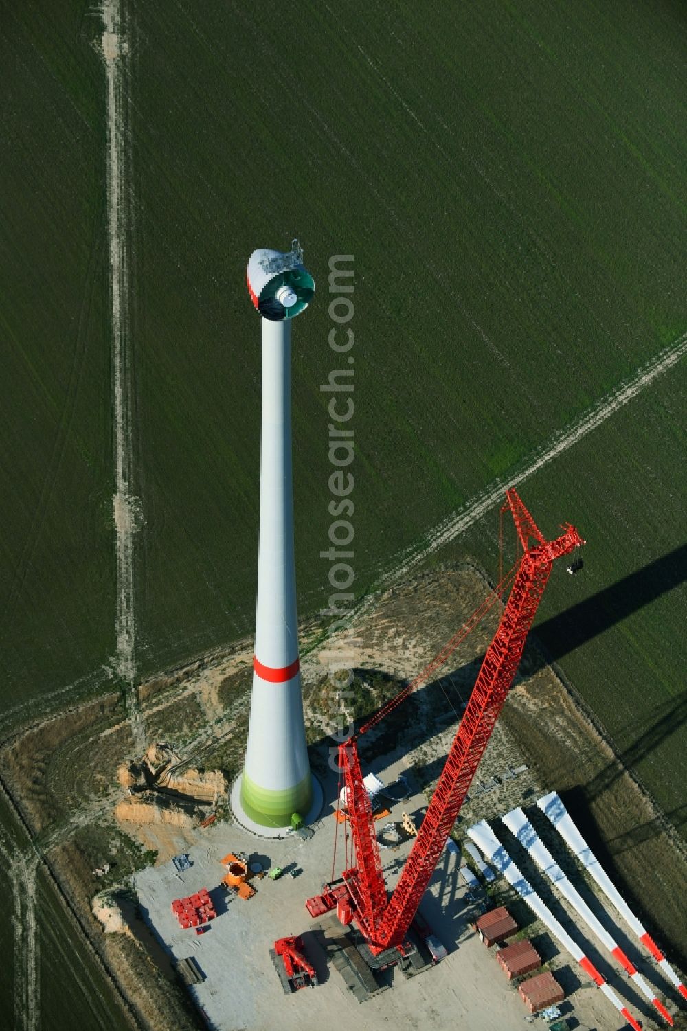 Aerial image Niedergörsdorf - Construction site for wind turbine installation on a field in Niedergoersdorf in the state Brandenburg, Germany