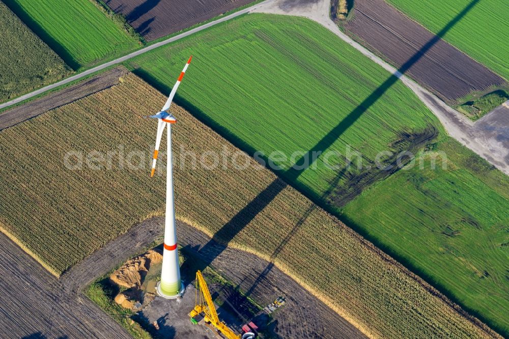 Aerial photograph Kutenholz - Construction site for wind turbine installation with long shade in Kutenholz in the state Lower Saxony, Germany