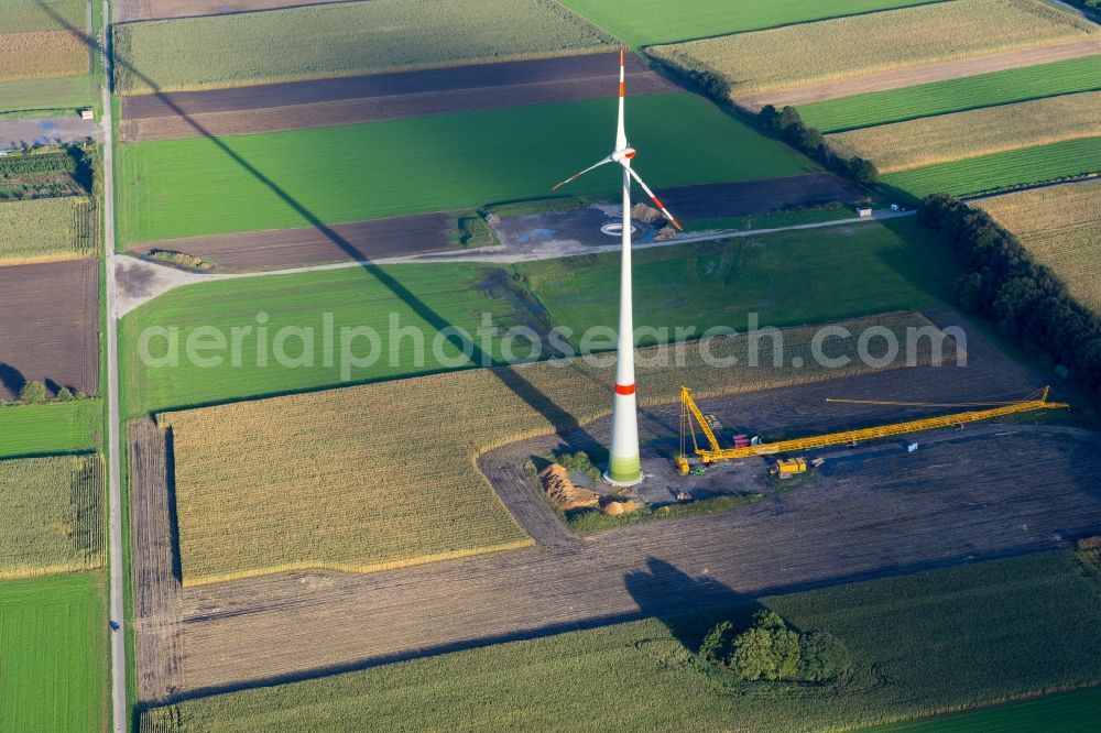 Kutenholz from the bird's eye view: Construction site for wind turbine installation with long shade in Kutenholz in the state Lower Saxony, Germany