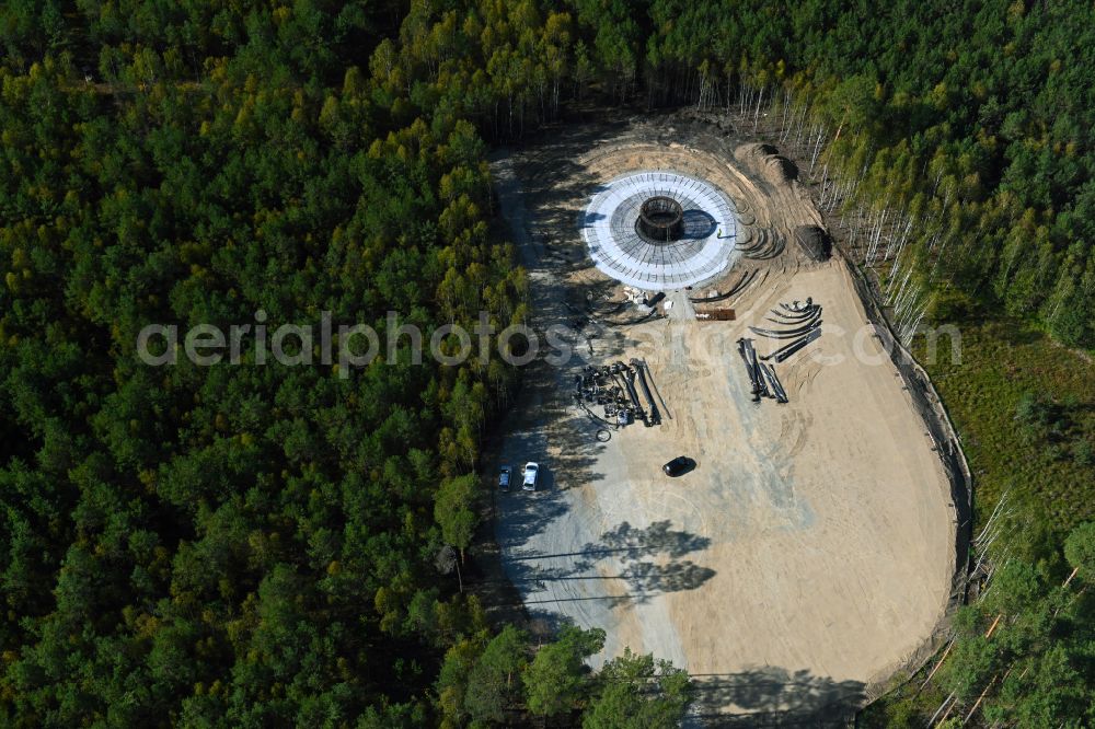 Spreenhagen from the bird's eye view: Construction site for the new construction of wind turbines (WEA) with wind turbines of the Uckley wind farm in a forest area in Spreenhagen in the state Brandenburg, Germany