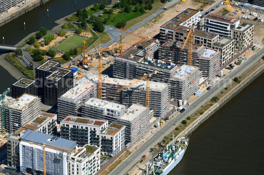 Aerial photograph Hamburg - Construction sites for residential and commercial buildings in the Baakenhafen along the Baakenallee in HafenCity in Hamburg, Germany