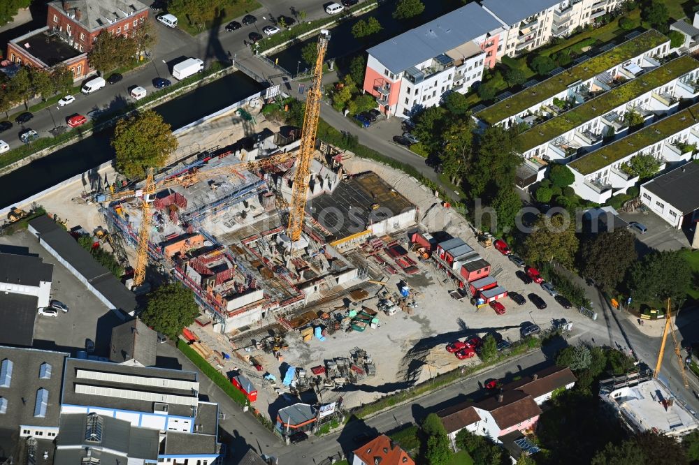 Augsburg from the bird's eye view: Construction site for City Quarters Building of the project KULT.QUARTIER between Walterstrasse and Zimmererstrasse on Proviantbach in Augsburg in the state Bavaria, Germany