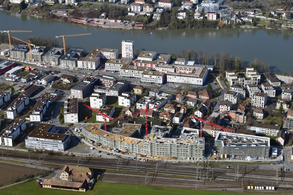 Aerial image Rheinfelden - Construction site for City Quarters Building Furnierwerk with housing and commercial units and the expansion of Salmenpark at the river Rhine in Rheinfelden, canton Aargau, Switzerland