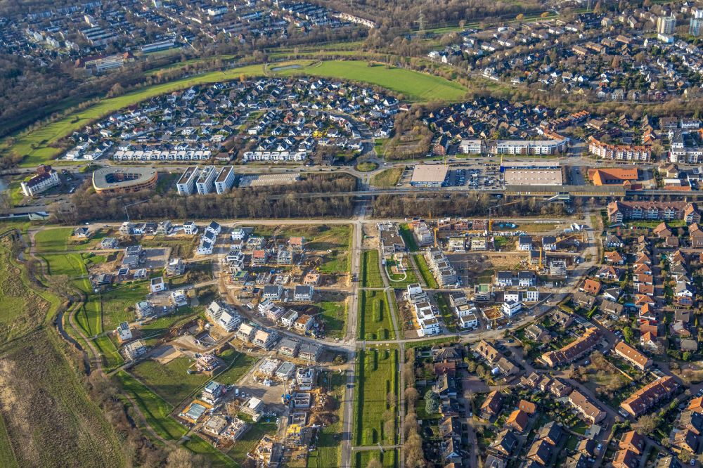 Duisburg from the bird's eye view: Construction sites for new construction residential area of detached housing estate Angerbogen on street Hermann-Spillecke-Strasse in the district Huckingen in Duisburg at Ruhrgebiet in the state North Rhine-Westphalia, Germany