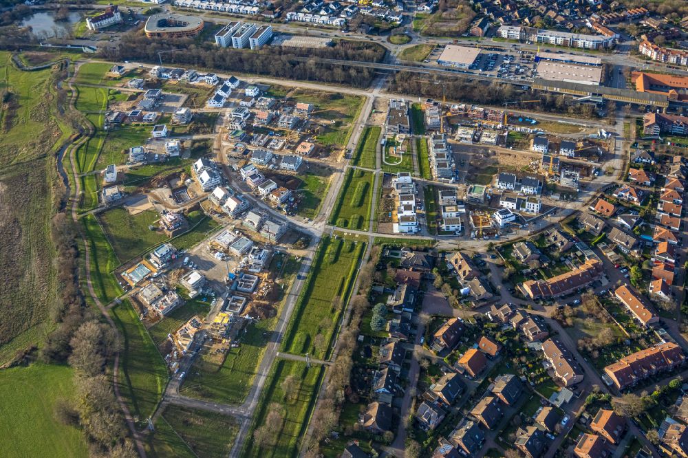 Aerial image Duisburg - Construction sites for new construction residential area of detached housing estate Angerbogen on street Hermann-Spillecke-Strasse in the district Huckingen in Duisburg at Ruhrgebiet in the state North Rhine-Westphalia, Germany