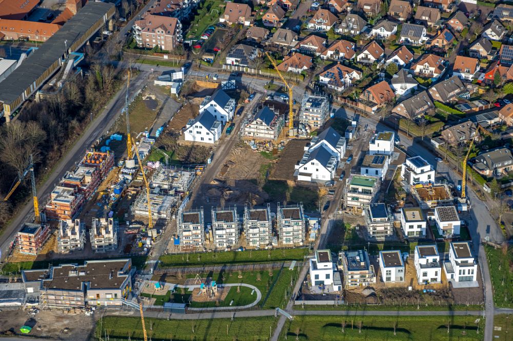 Aerial photograph Duisburg - Construction sites for new construction residential area of detached housing estate Angerbogen on street Hermann-Spillecke-Strasse in the district Huckingen in Duisburg at Ruhrgebiet in the state North Rhine-Westphalia, Germany