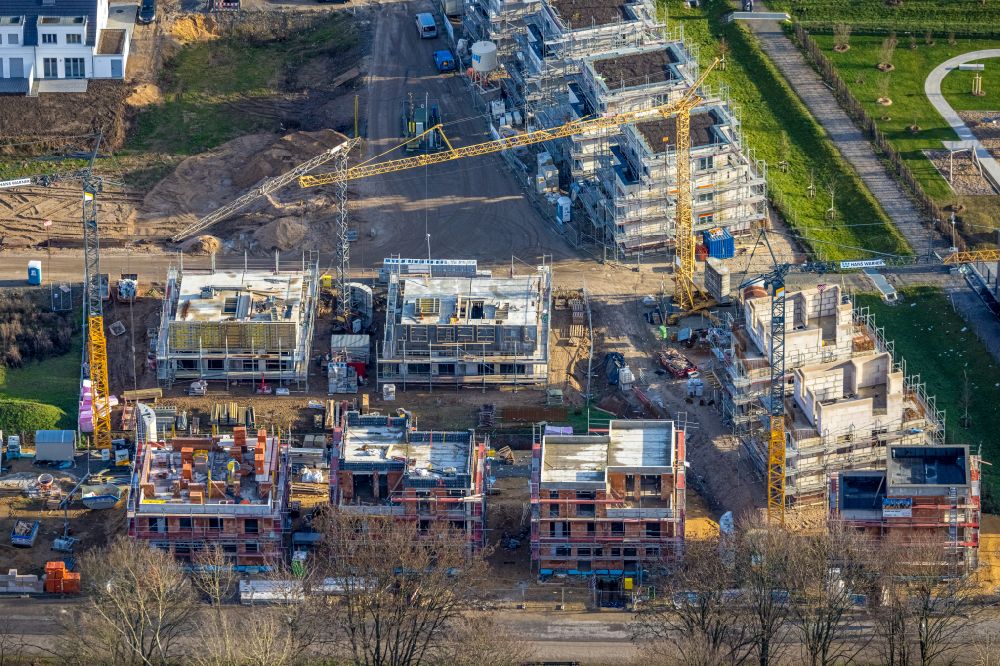 Aerial photograph Duisburg - Construction sites for new construction residential area of detached housing estate Angerbogen on street Hermann-Spillecke-Strasse in the district Huckingen in Duisburg at Ruhrgebiet in the state North Rhine-Westphalia, Germany