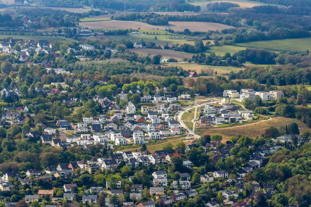 Essen from the bird's eye view: Construction sites for new construction residential area of detached housing estate Gruene Harfe on Barkhover Feldweg in Essen in the state North Rhine-Westphalia, Germany